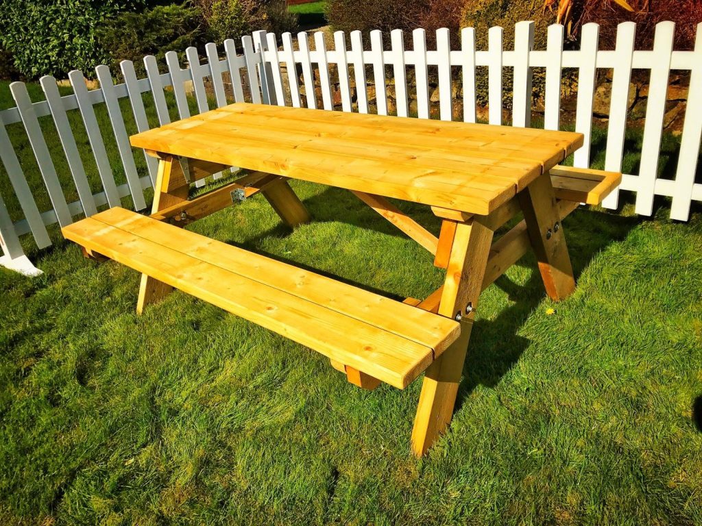 Wooden picnic benches for hire from stage men